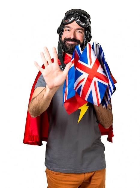 Superhero Counting Five Flags – Free Stock Photo Download