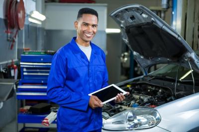 Mechanic Using Digital Tablet – Free Stock Photo, Download Free Stock Photo