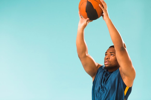 Side View of Athletic Man Playing Basketball – Free Stock Photo for Download