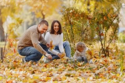 Cute and Stylish Family Playing in an Autumn Field – Free Stock Photo Download