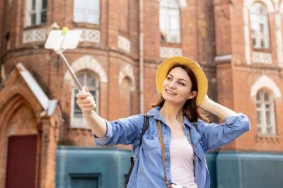 Chic Outdoor Selfie of a Woman in a Hat – Download Free Stock Photo