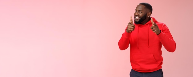 Cheeky Young Black Guy in Red Hoodie Congratulating Friend â Free Download