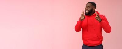 Cheeky Young Black Guy in Red Hoodie Congratulating Friend â Free Download