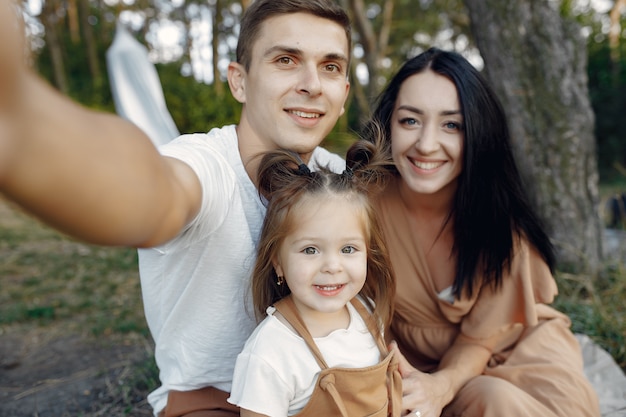 Cute Family Enjoying a Fun Day in an Autumn Field – Free Stock Photo for Download