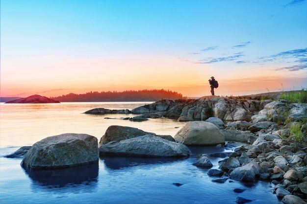 Silhouette of a Tourist with Camera on a Mysterious Island – Free Stock Photo, Download for Free