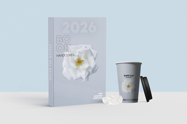 Book Mockup Featuring a Coffee Cup â Free to Download