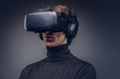 Man Wearing Virtual Reality Device – Free Stock Photo for Download