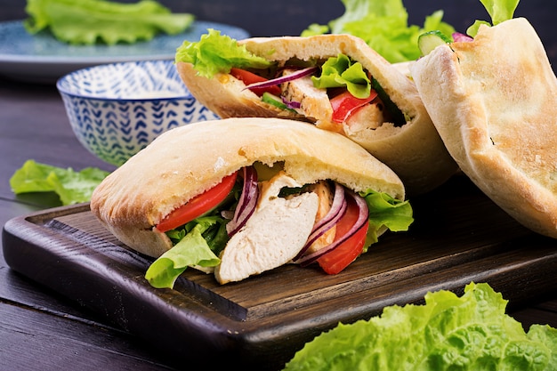 Pita Stuffed with Chicken, Tomato and Lettuce – Free Stock Photo for Free Download