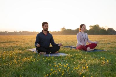 Outdoor Yoga Pose: Man and Woman in Harmony – Free Download