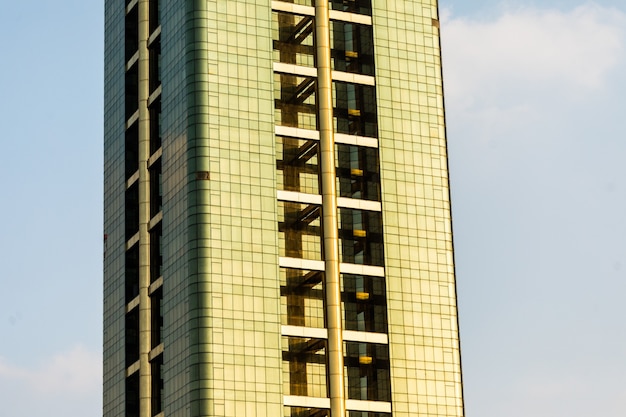 Tall and Colorful Skyscrapers Against a Beautiful Blue Sky – Download Free Stock Photo