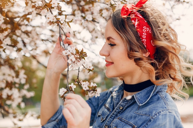 Elegant Girl Enjoying a Spring Park – Free Download