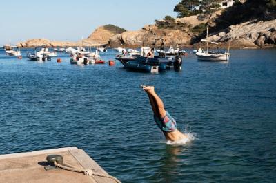 Dynamic Close-Up of a Man Jumping in Water – Free Download