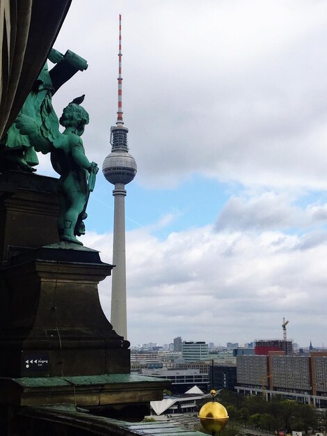 Statue Under a Cloudy Sky – Free Stock Photo for Download