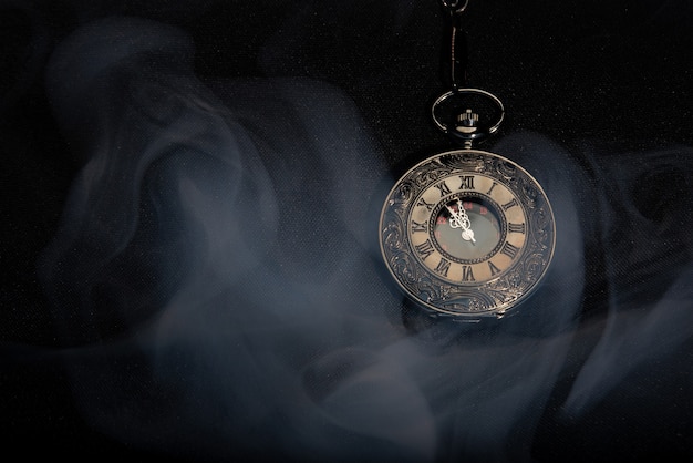 Vintage Pocket Watch with Smoke on Black Background – Free Stock Photo for Download