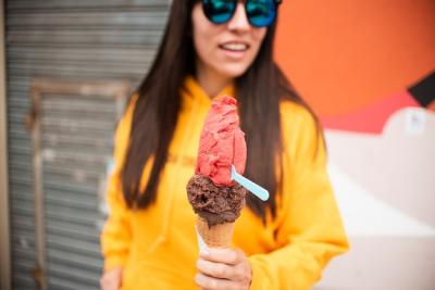 Close-up of a Casual Woman Enjoying Ice Cream – Free to Download