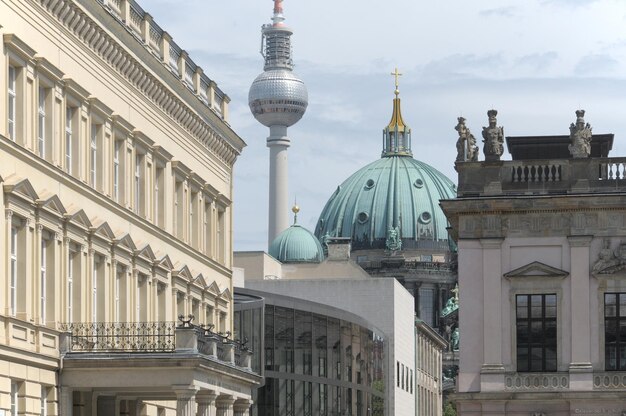 Fernsehturm and Berlin Cathedral Amidst City Buildings – Free Download