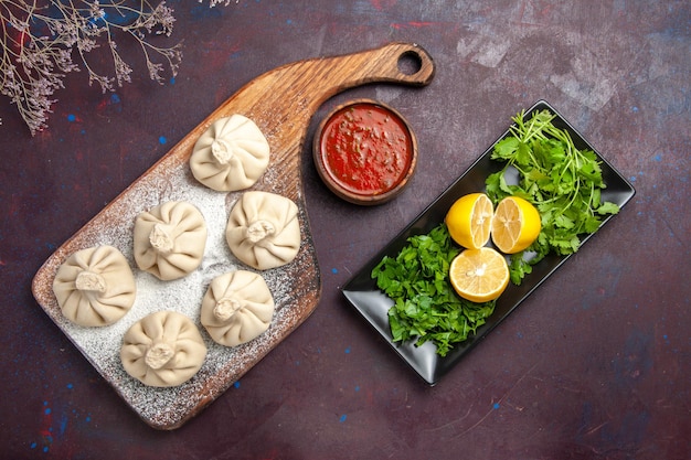 Raw Dumplings Dough with Tomato Sauce and Lemon – Free Stock Photo for Download