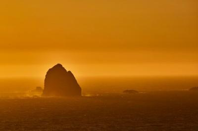 Golden Seascape with Silhouetted Island at Sunset – Free Stock Photo for Download