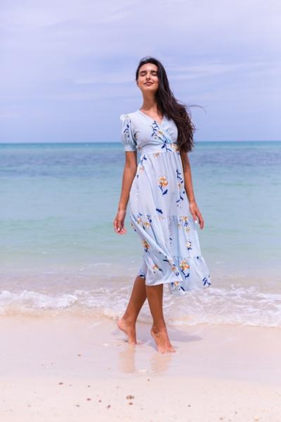 Romantic Portrait of Woman in Long Blue Dress on Beach at Windy Day – Free Stock Photo, Download Free