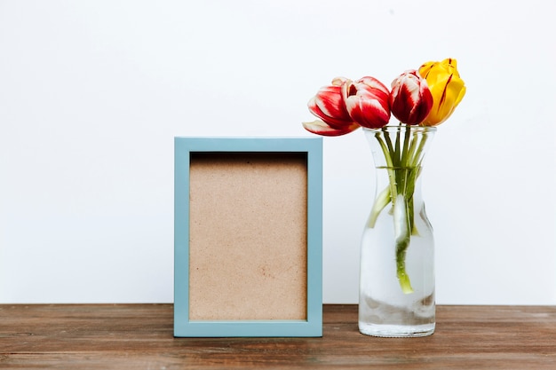 Vase with Tulips Near Frame – Free to Download