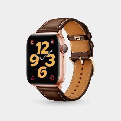 A Stylish Watch Featuring a Brown Leather Band and Black Face – Free Download