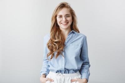 Meet Your New Teammates: Pleased Businesswoman in Transparent Glasses – Free Stock Photo for Download