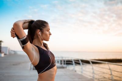 Young Beautiful Sportive Girl Training at Sunrise Over Seaside – Free Download