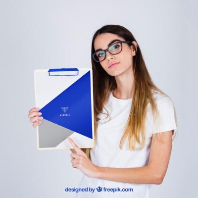 Young Woman Presenting Clipboard Mockup – Free Stock Photo, Download Free