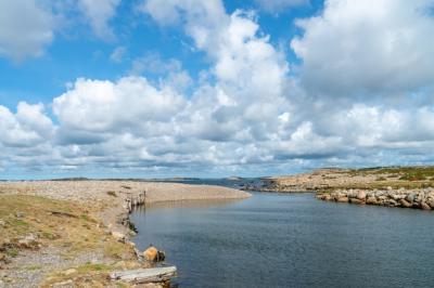 River Scene with Rocks and Clouds – Free Download