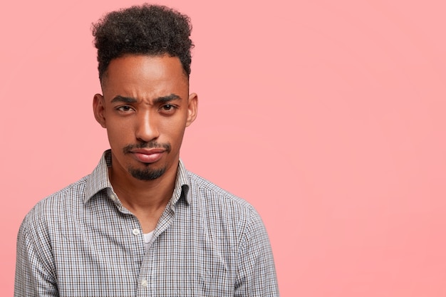 Young African-American Man in Striped Shirt – Free Stock Photo, Download for Free