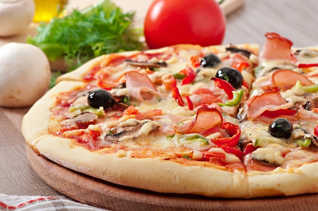 Delicious Pizza with Ham, Mushrooms, and Olives – Free Download