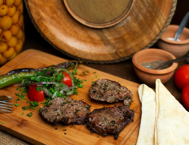 Fried Meat Slices with Fresh Vegetables on Brown Wooden Desk – Free Download