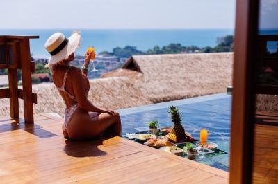 Stunning Tanned Woman in Bikini Enjoying Floating Breakfast by Luxury Villa Pool – Free Stock Photo for Download