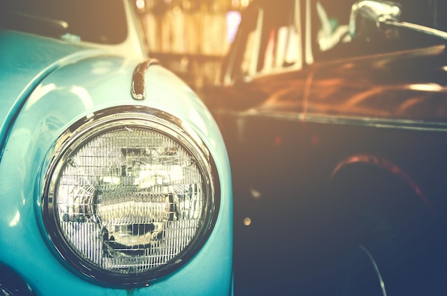 Close-up of Car Headlight in Parking Lot – Free Stock Photo for Download