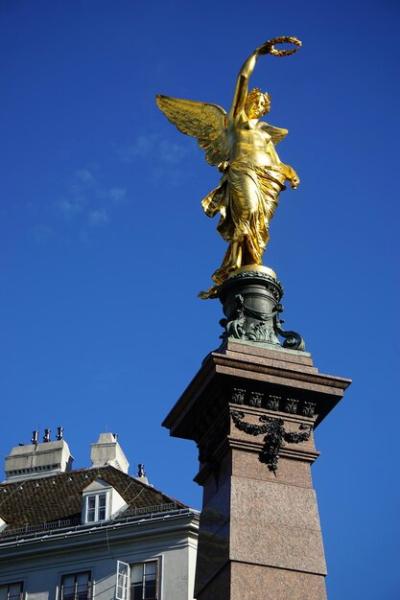 Stunning Low Angle View of Statue Against Blue Sky – Free Download