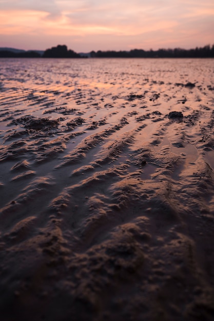 Stunning Sand Patterns at Low Tide During Sunset – Free Download