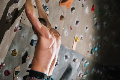 Muscular Man Climbing Wall – Free Stock Photo for Download