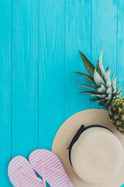 Hat, Pineapple, and Flip Flops on Blue Wooden Surface – Free Download