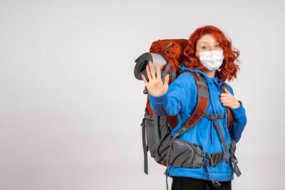 Female Tourist on Mountain Trip with Backpack – Free Download