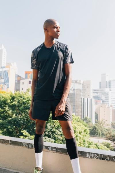 Portrait of an Athletic Male Runner on Rooftop – Free Stock Photo, Download for Free