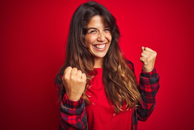 Young Beautiful Woman in Casual Jacket Smiling and Pointing – Free Stock Photo for Download