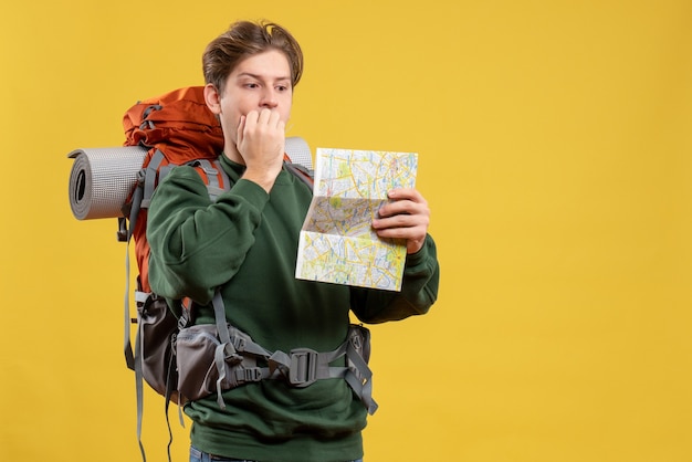 Young Male Holding Map with Backpack – Free Stock Photo for Download