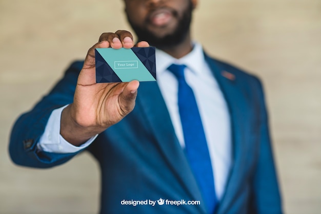 Businessman Displaying Business Card – Free Stock Photo for Download