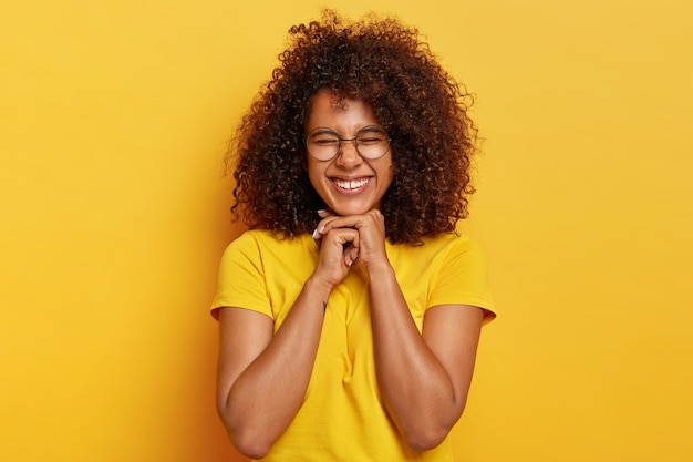 Charming Afro Girl with Curly Hair in Joyful Pose – Free Download