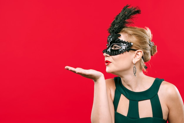 Woman in Black Mask Blowing Kiss – Free Stock Photo, Download for Free