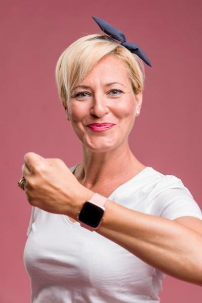 Middle Aged Woman Using Fitness Tracker – Free to Download