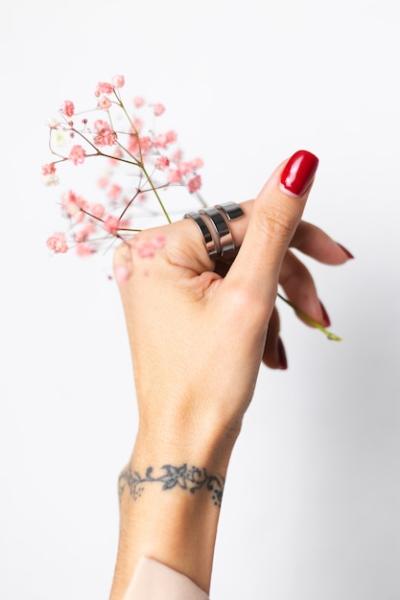 Gentle Hand Holding Pink Dried Flowers with Red Manicure – Free Stock Photo, Download Free