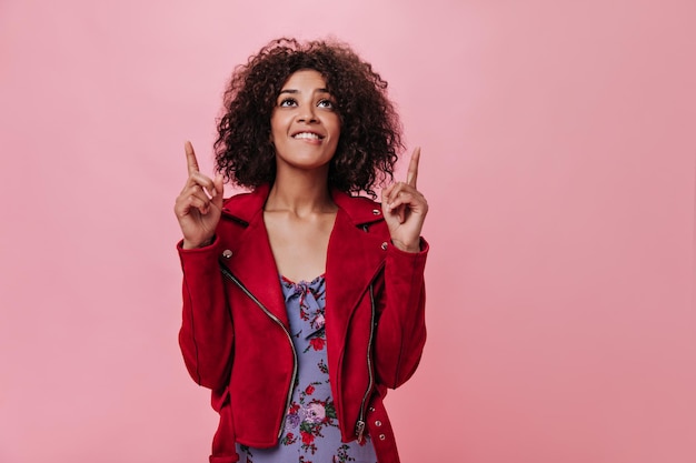 Darkskinned Woman in Red Jacket and Curly Lady in Floral Dress – Free Stock Photo for Download