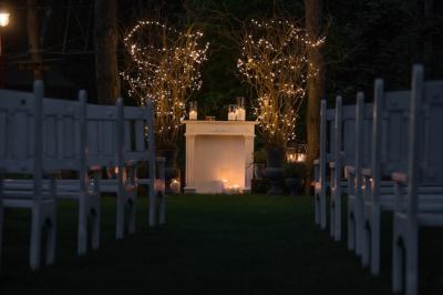 Wedding Altar Surrounded by Cozy Fireplace and Candles – Free Download