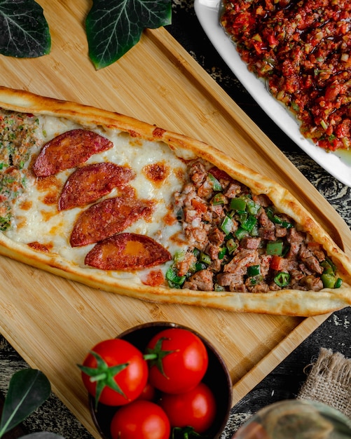 Mixed Pide with Meat, Sausage, and Vegetables – Free Stock Photo for Download